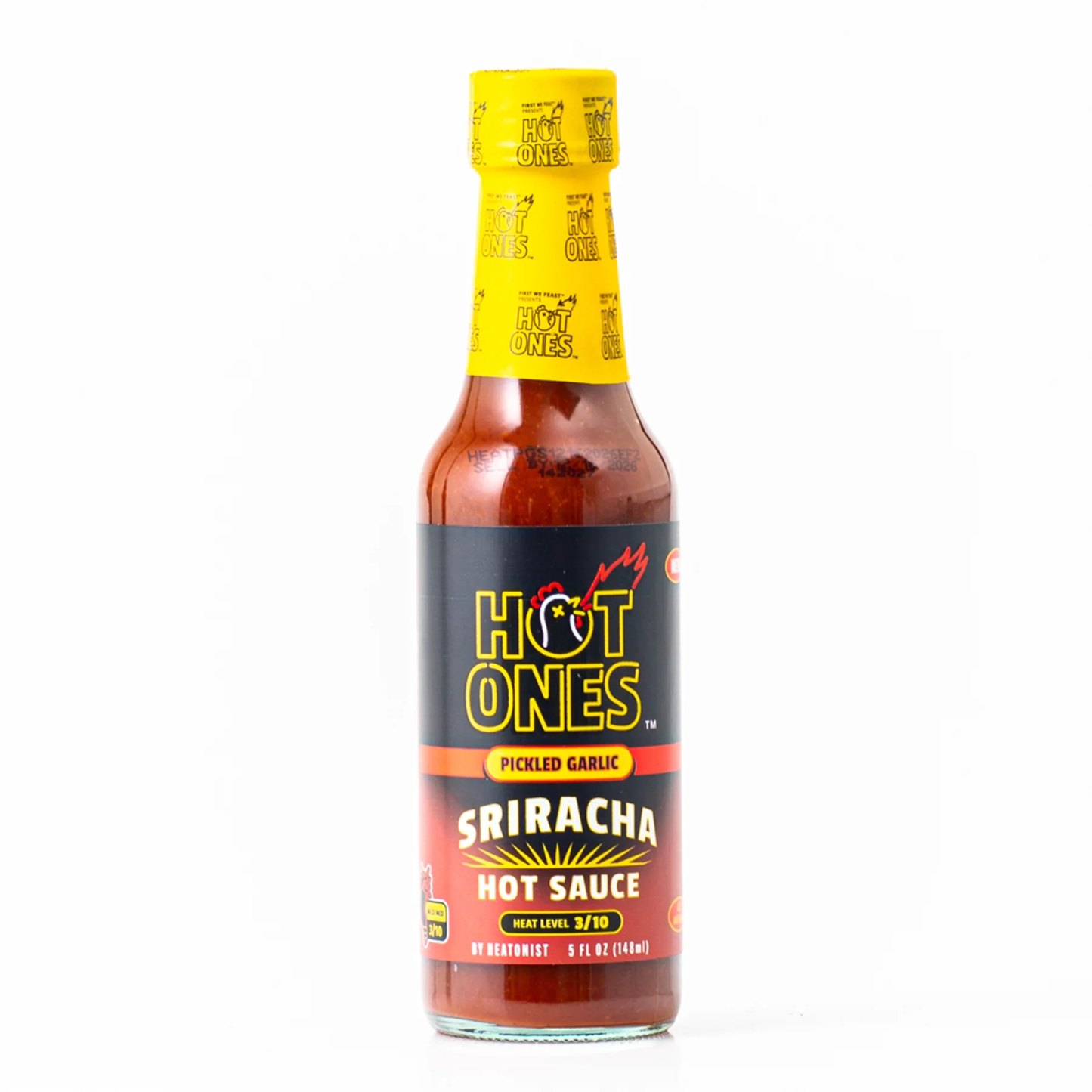 Rahlo pekoča omaka Hot Ones Pickled Garlic Sriracha je sriracha stil omake z dodatkom vloženega česna in manj sladkobe.