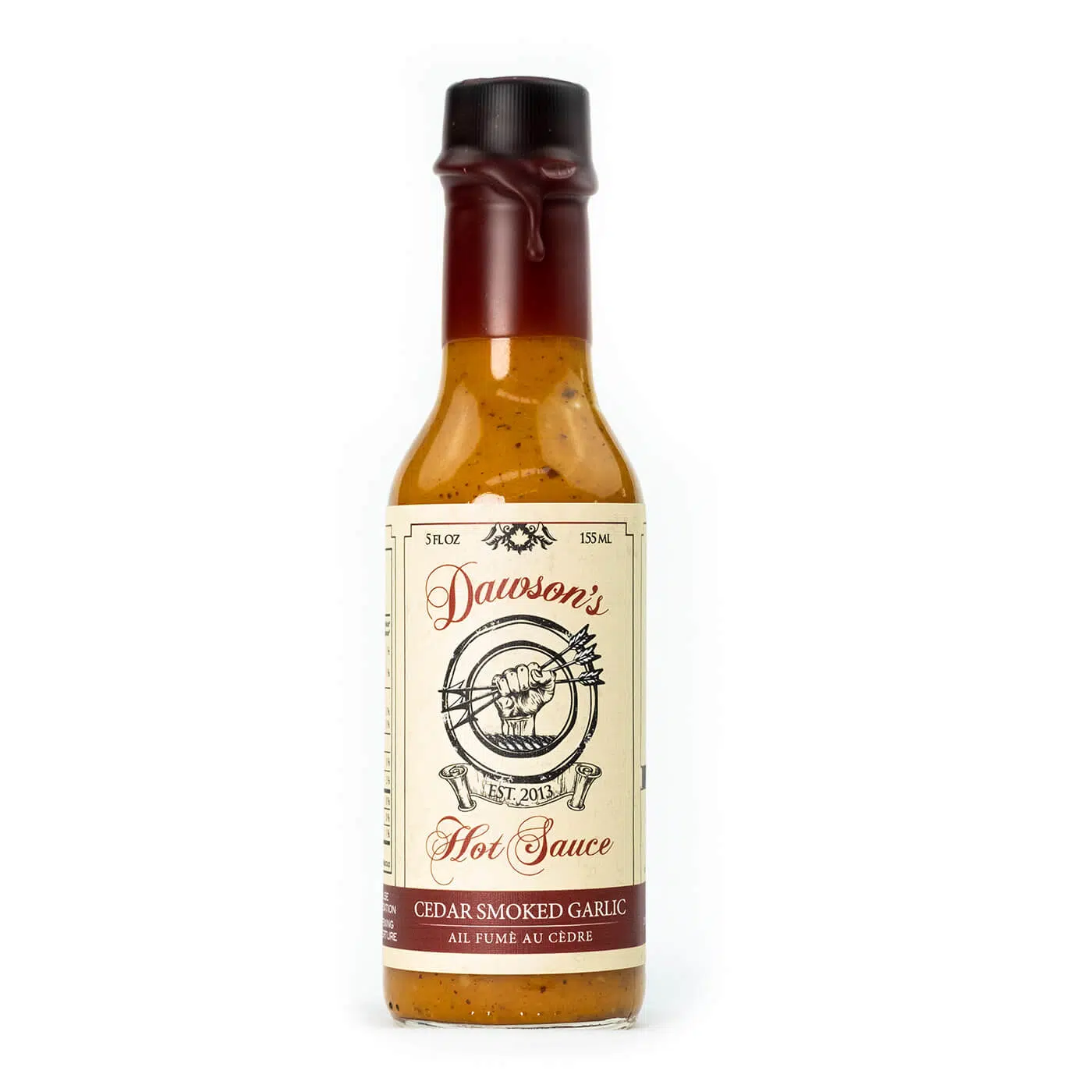 Pekoča omaka Dawson's Cedar Smoked Garlic ima globok karakter dimljenega česna, habanero čilijev in posebnega belega vinskega kisa. 