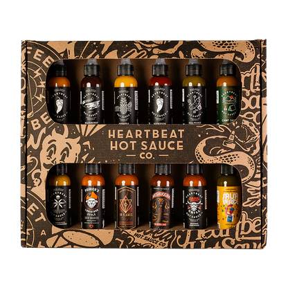 Heartbeat 12 Mini Pack degustacijski komplet z dvanajstimi mini craft pekočimi omakami različnih stilov, od sadnih habanero omak do verde in garlic variant.