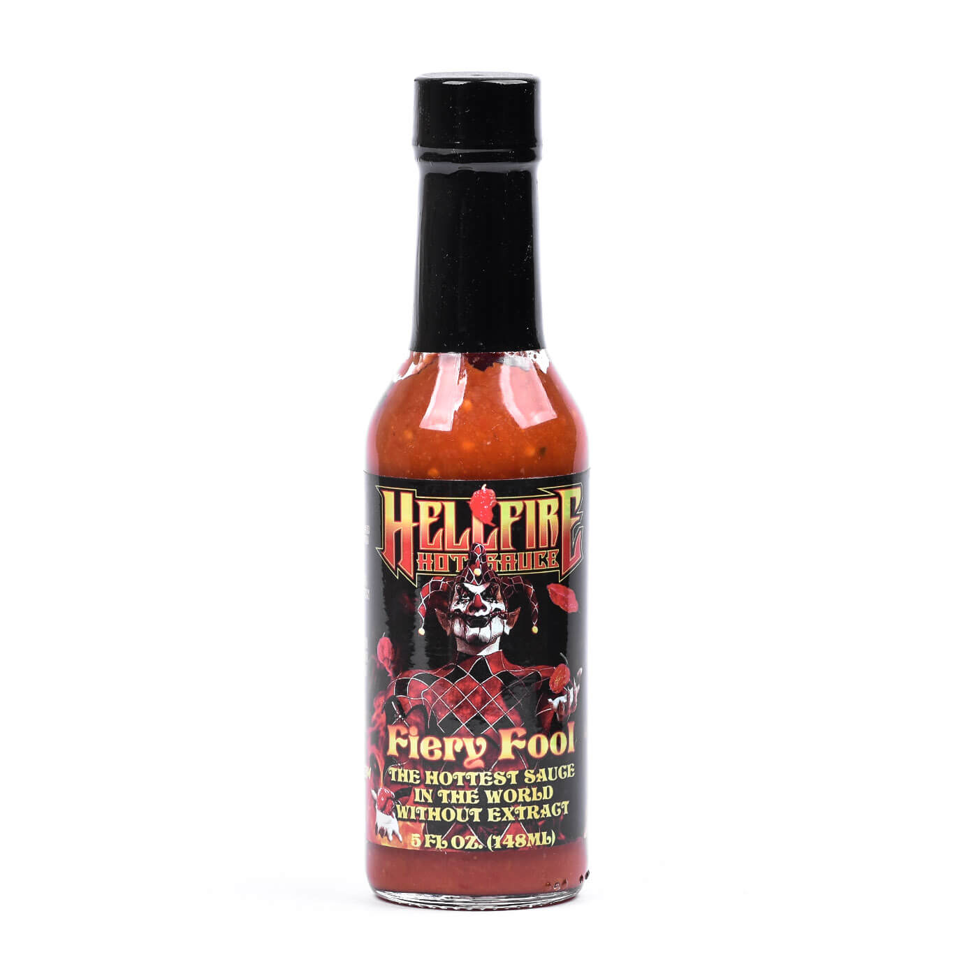 Hellfire Hot Sauce Fiery Fool z več kot 80 % čili mase iz 7-Pot, Carolina Reaper, Trinidad Scorpion in Ghost Pepper, uravnotežena s sušenimi paradižniki, česnom, morsko soljo in limoninim sokom.