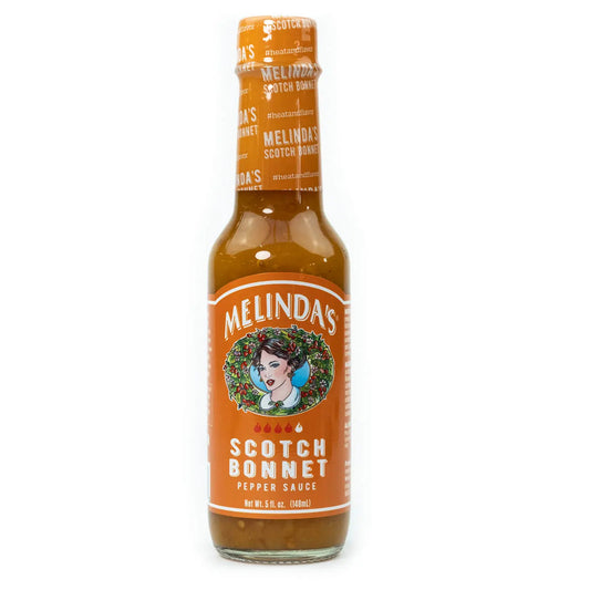 Melinda’s Scotch Bonnet je sadno pikantna omaka s čiliji Scotch Bonnet, papajo in pasijonko, idealna za karibsko kuhinjo, koktajle in mesne jedi.